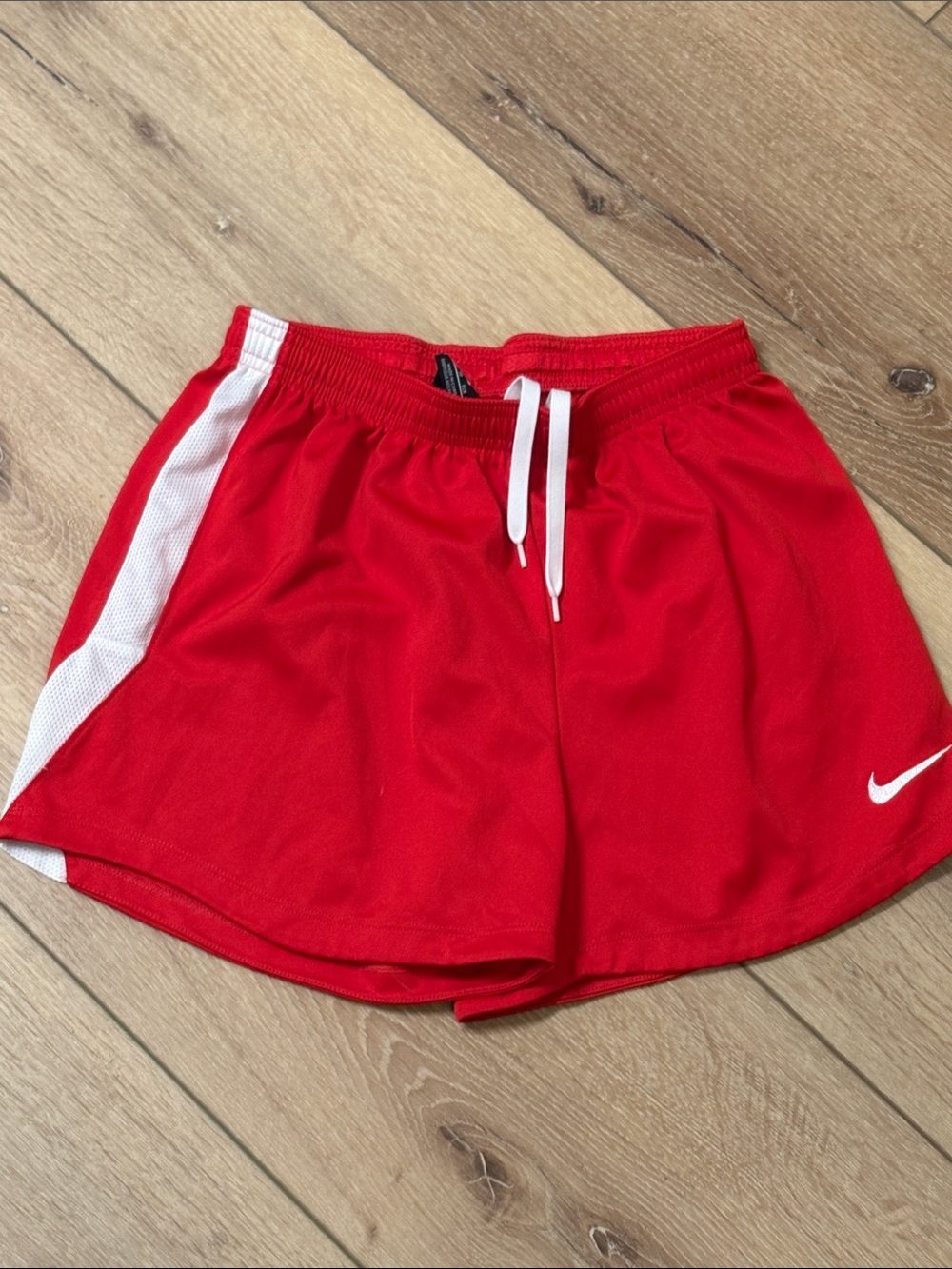 Nike Women's Red Athletic Shorts with White Stripe